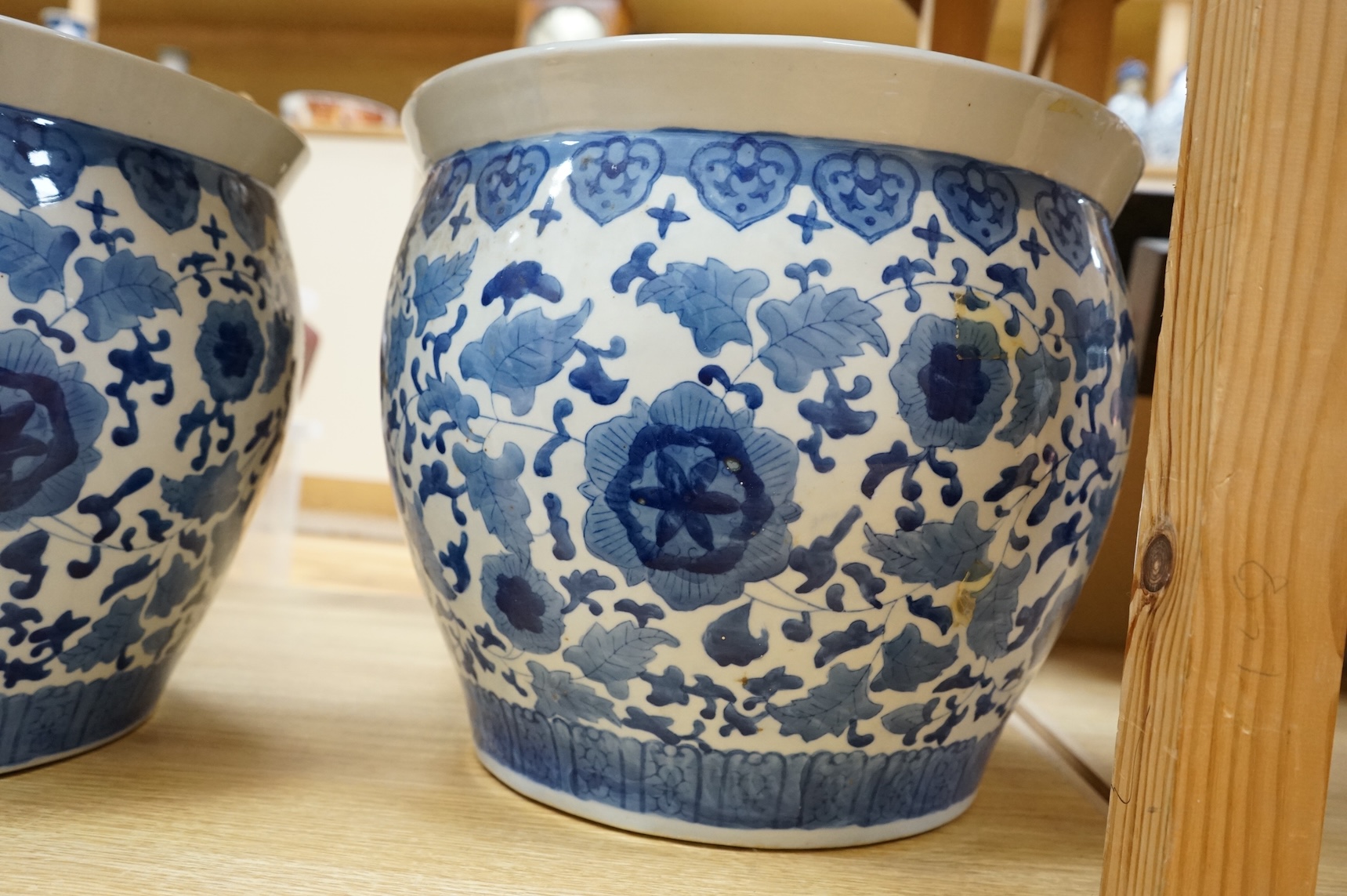 A pair of Chinese blue and white jardinieres, 30cm high